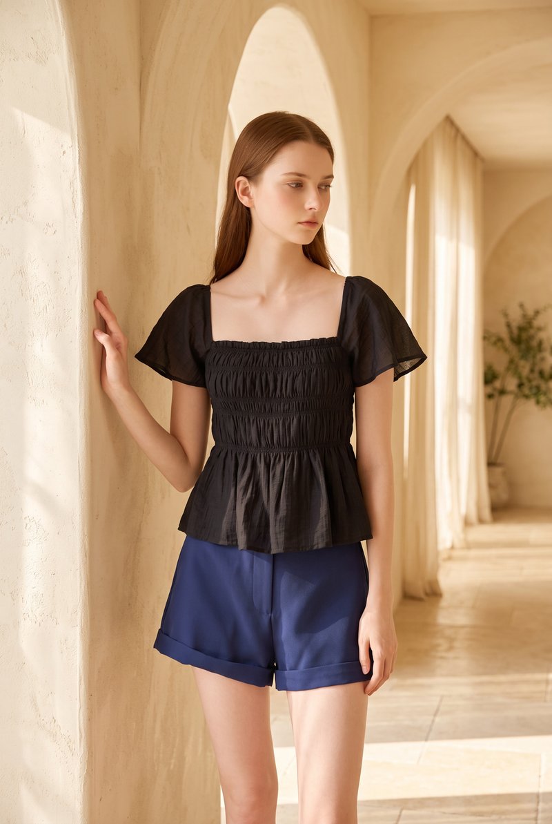Calista Textured Smocked Top In Black