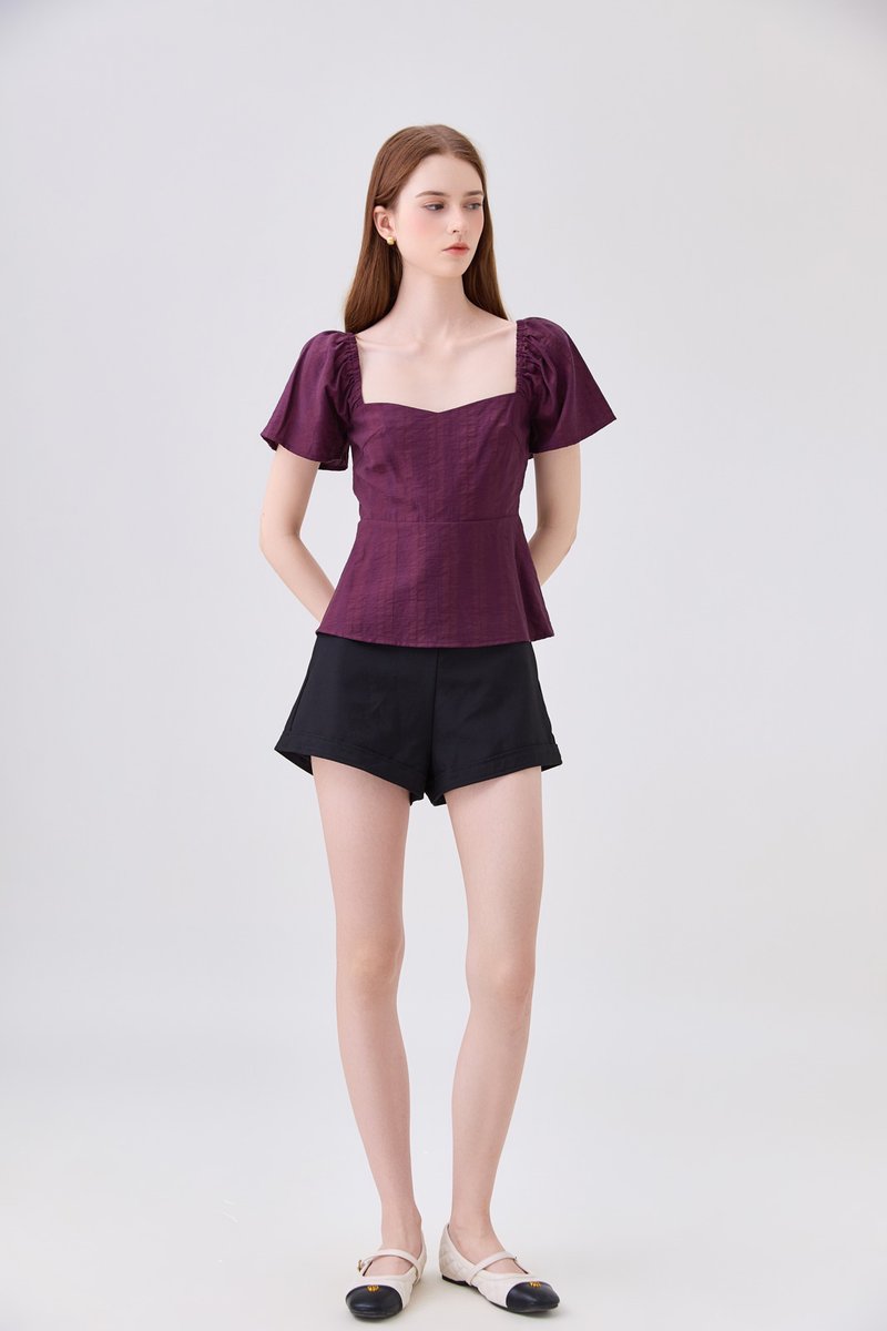 Zelia Peplum Top In Plum