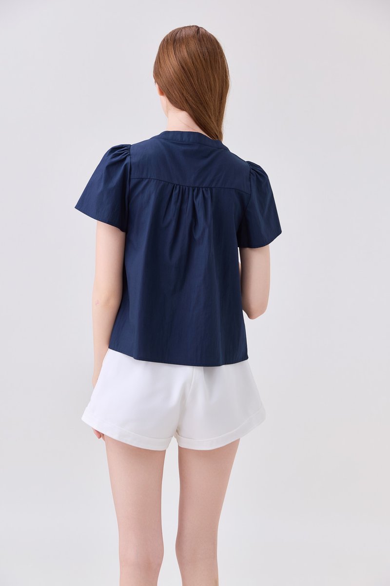 Journee Pintuck Ribbon Top In Navy