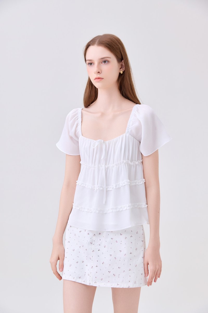 Evelina Textured Ruffles Ribbon Top In White