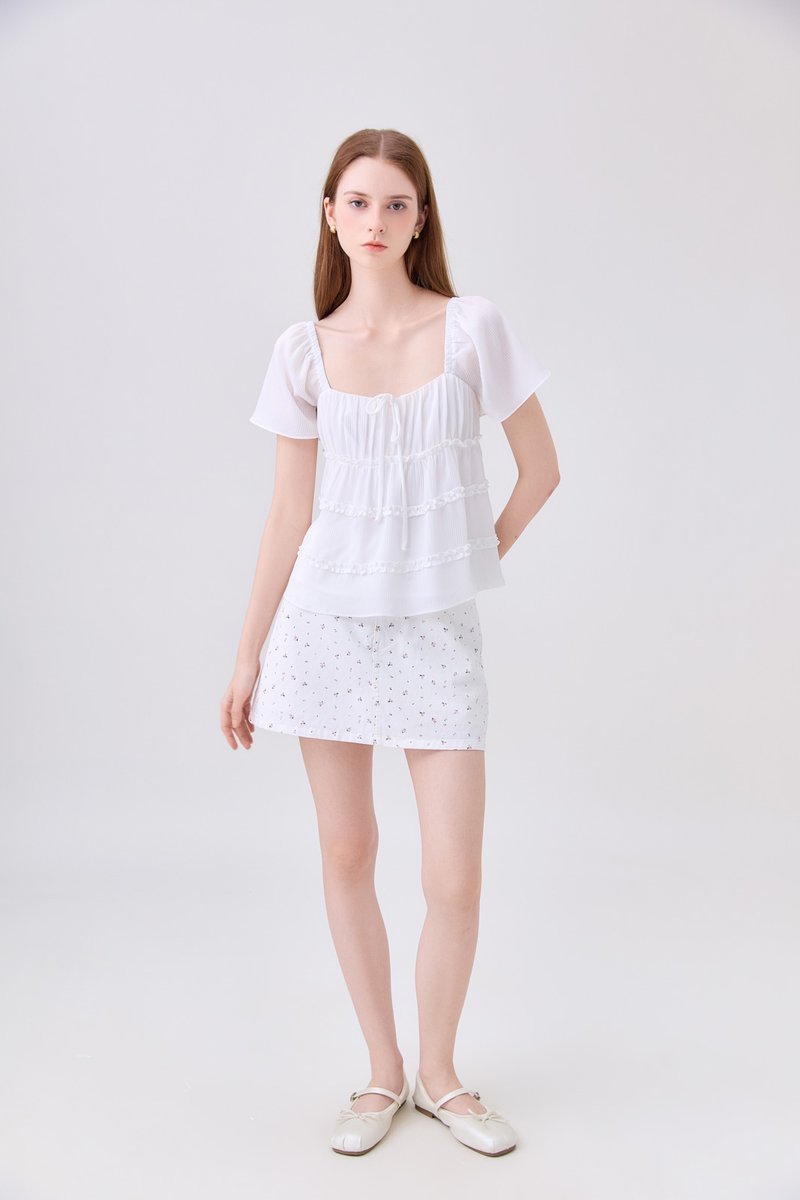 Evelina Textured Ruffles Ribbon Top In White