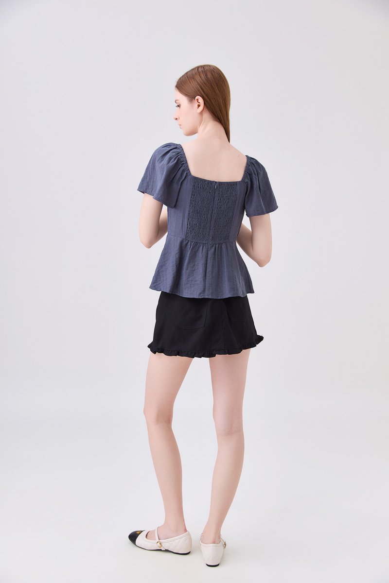 Zelia Peplum Top In Gunmetal