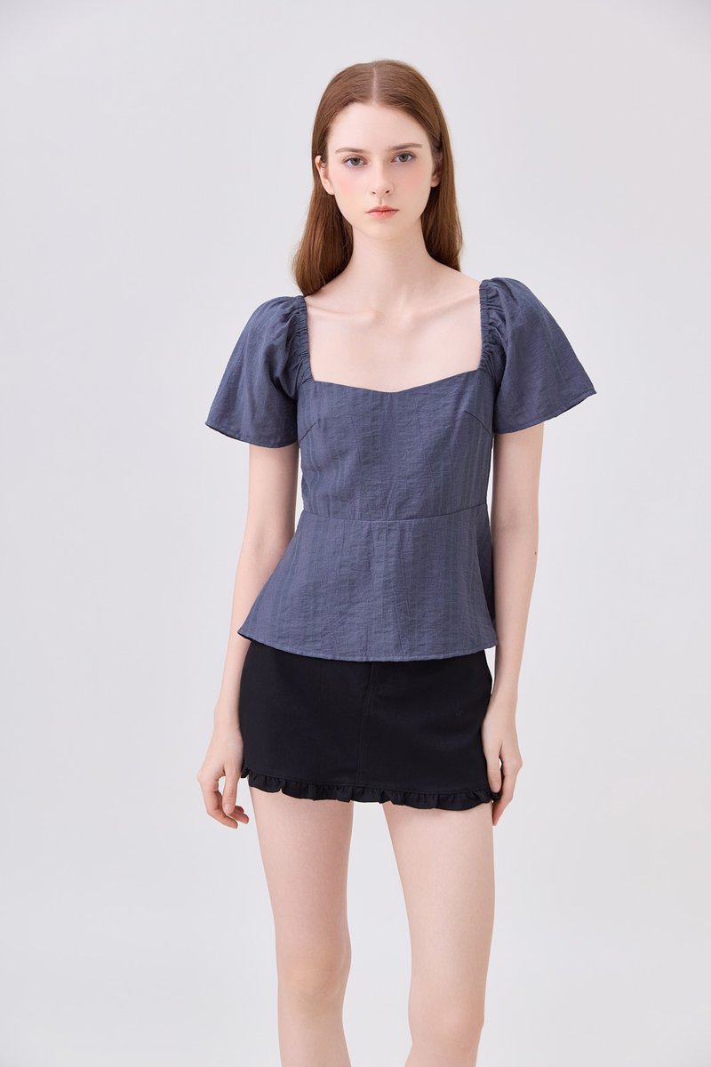 Zelia Peplum Top In Gunmetal