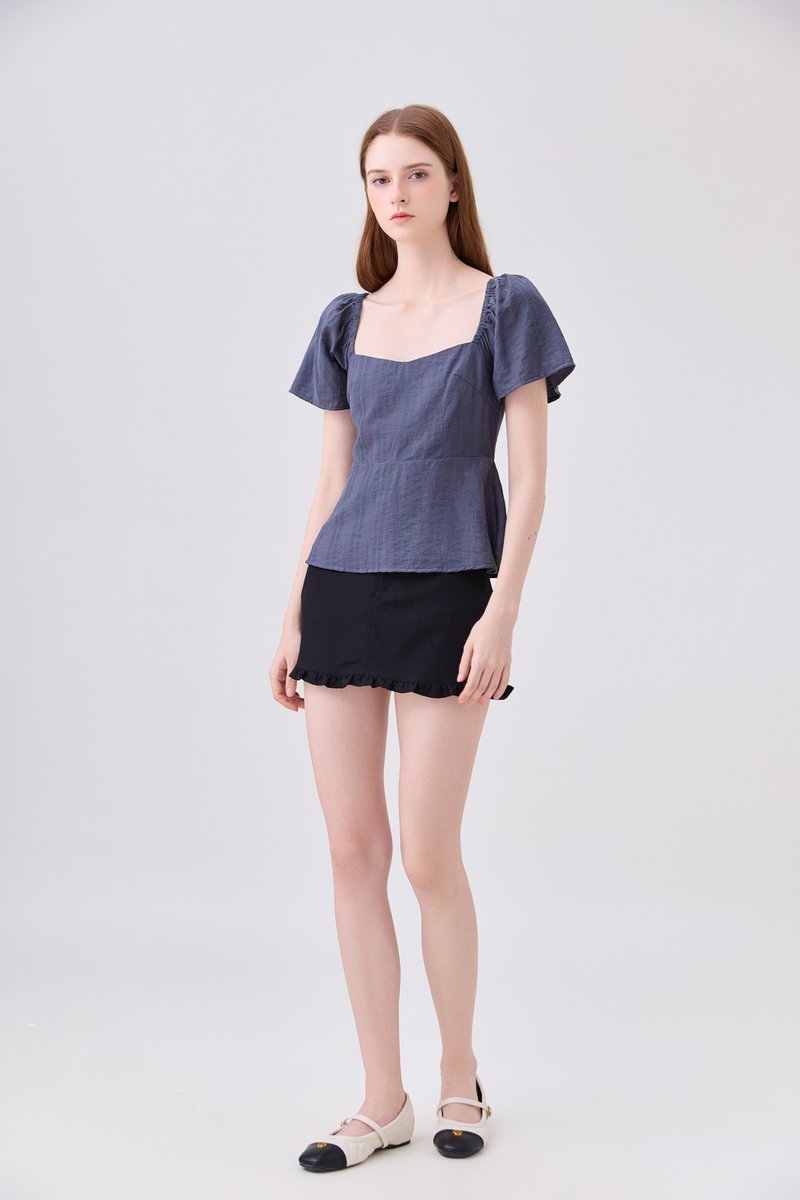Zelia Peplum Top In Gunmetal