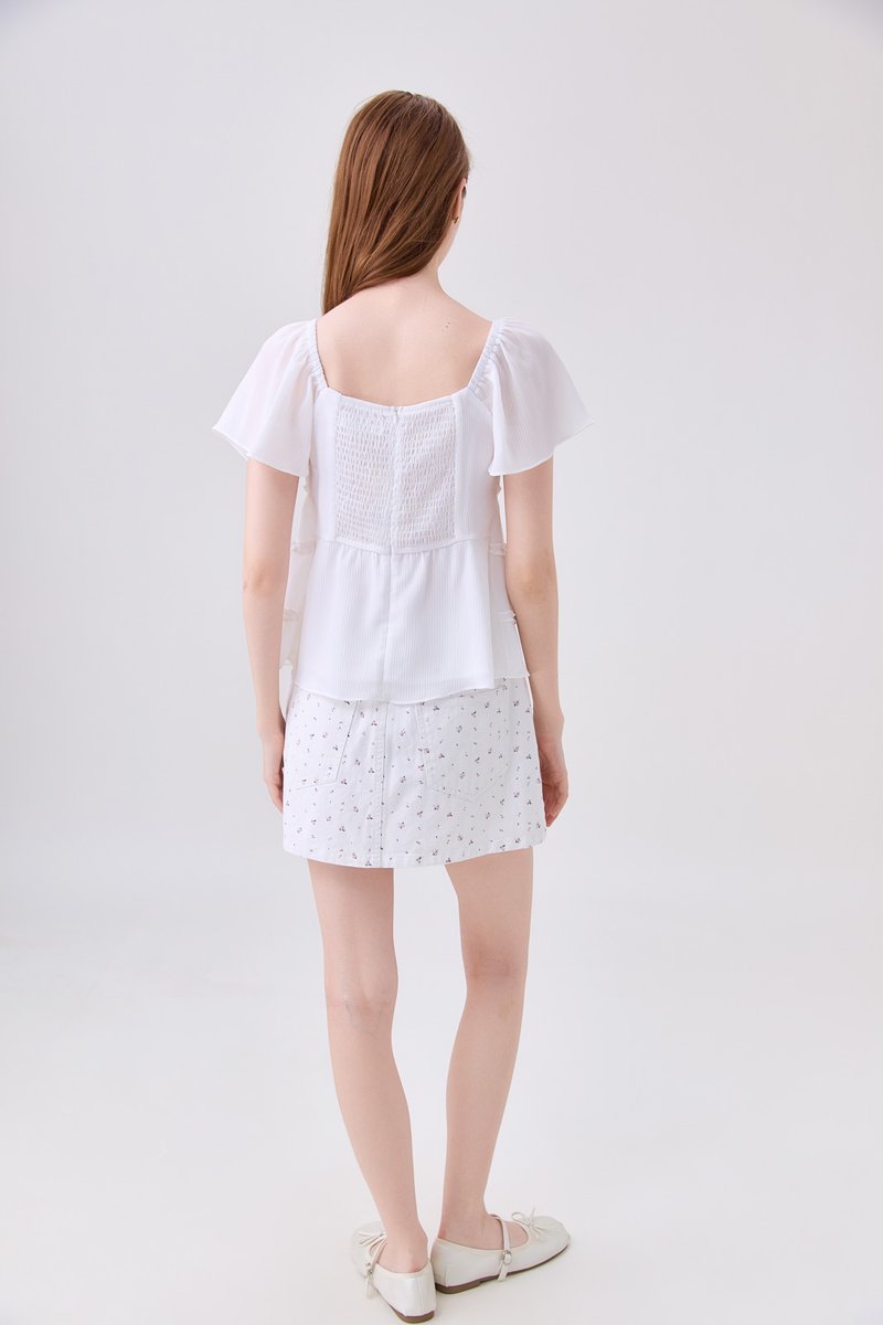Evelina Textured Ruffles Ribbon Top In White