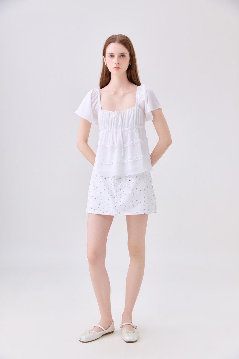 Evelina Textured Ruffles Ribbon Top In White