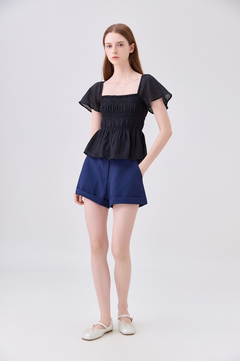 Calista Textured Smocked Top In Black