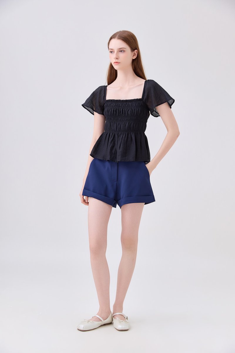 Calista Textured Smocked Top In Black