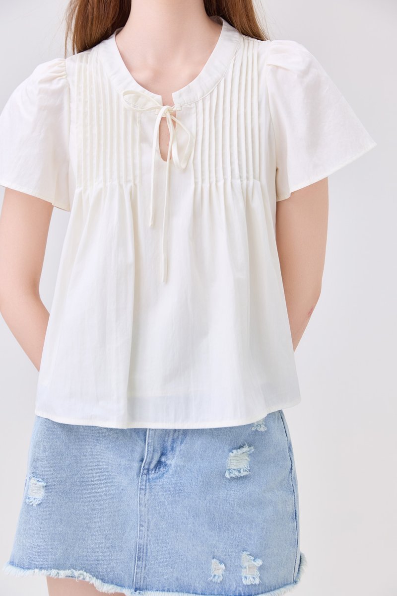 Journee Pintuck Ribbon Top In Cream