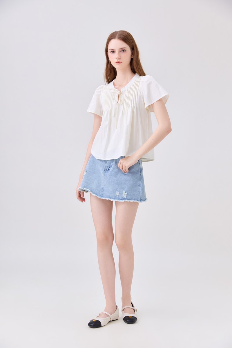 Journee Pintuck Ribbon Top In Cream