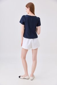 Mariana Pintuck Ribbon Top In Navy