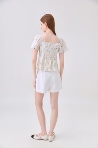 Klarity Floral Ruched Top In Cream