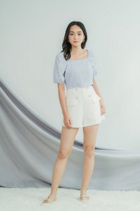Elina Button Pocket Shorts in White (XS)