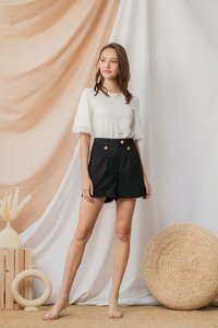 Nyla Button Pocket Shorts in Black (XS)