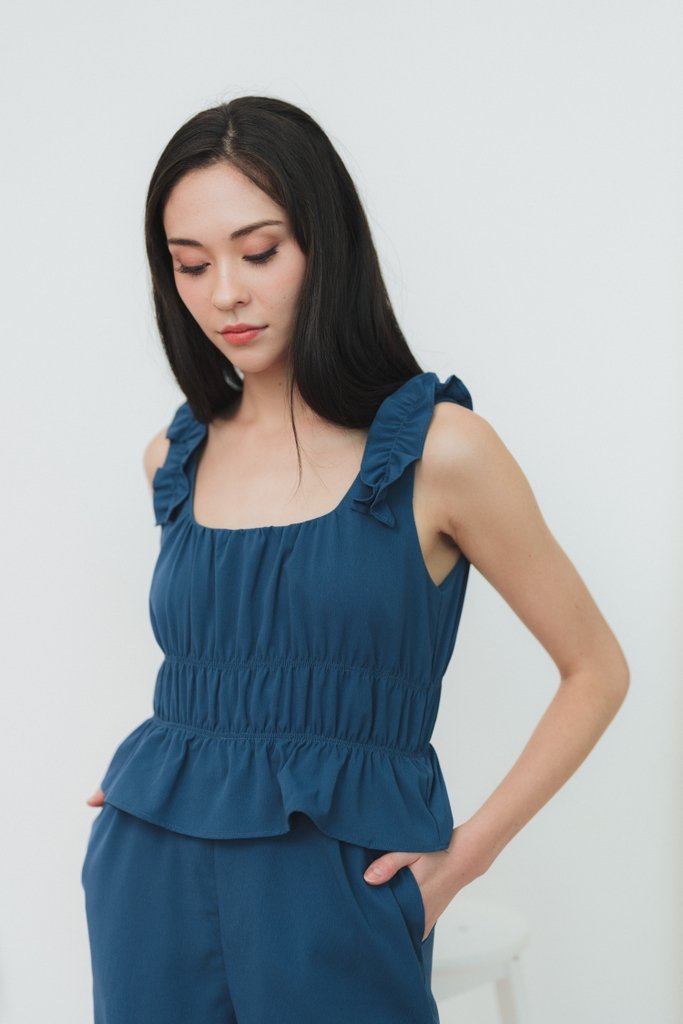 Shania Ruffles Romper in Teal Blue